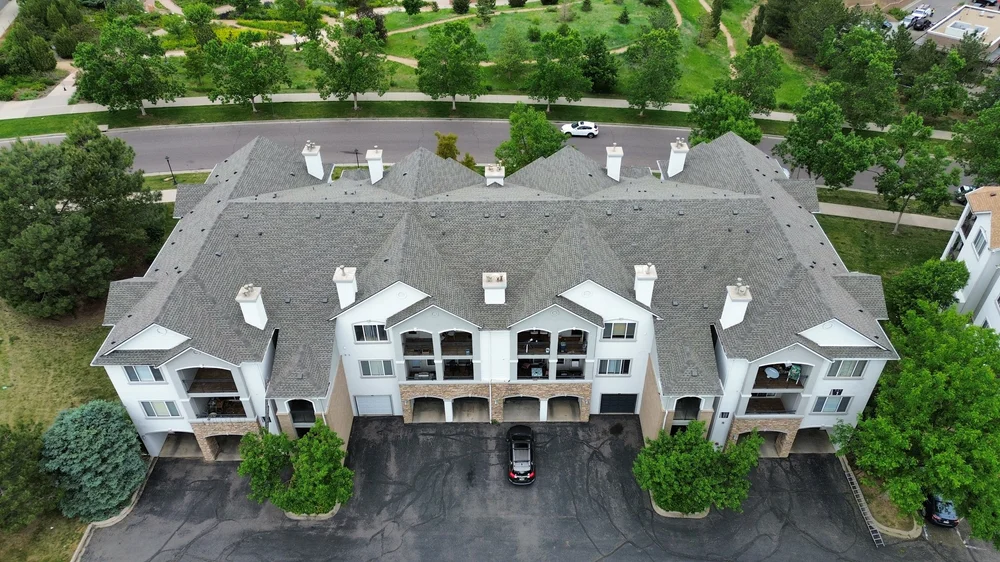 Aerial view of multifamily roofing work