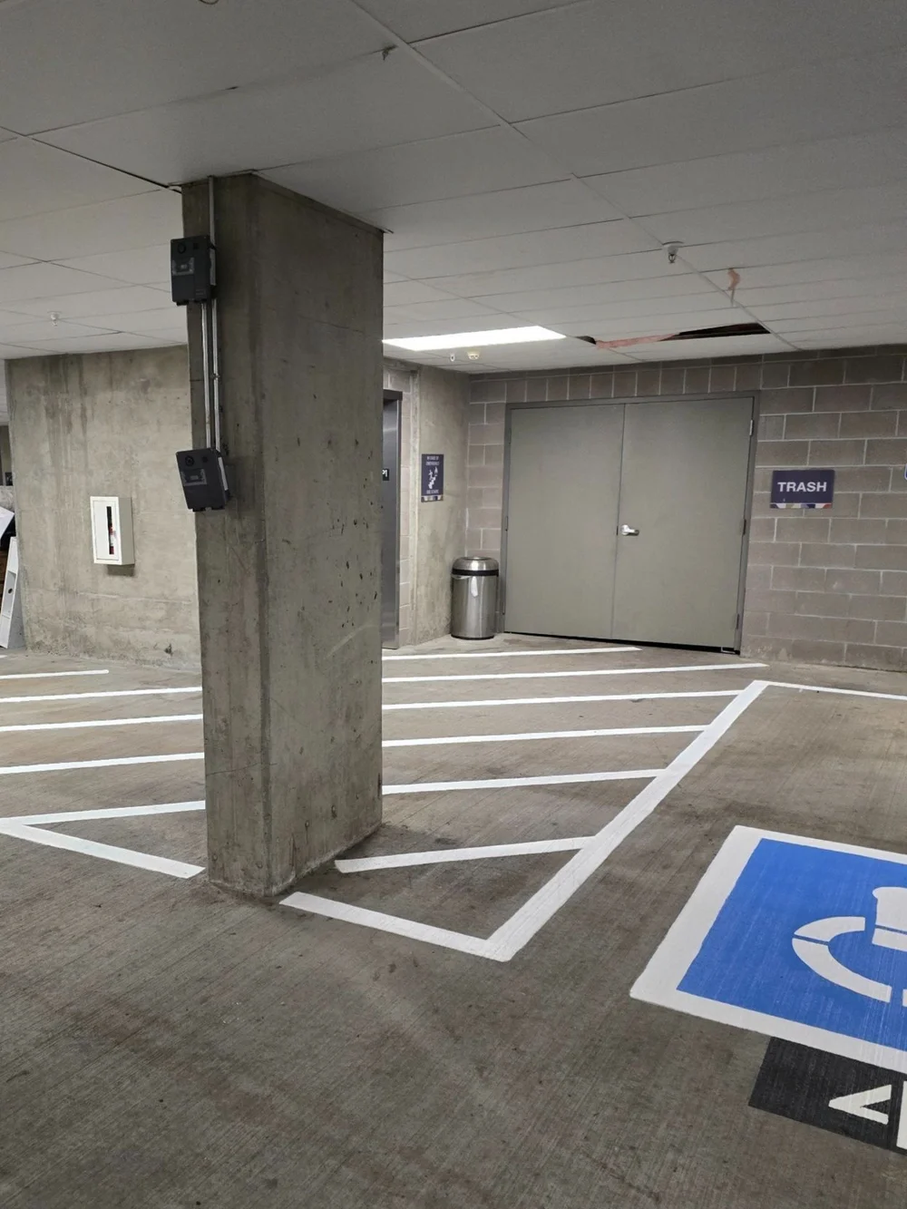 Pressure washing and restriping project in a parking garage