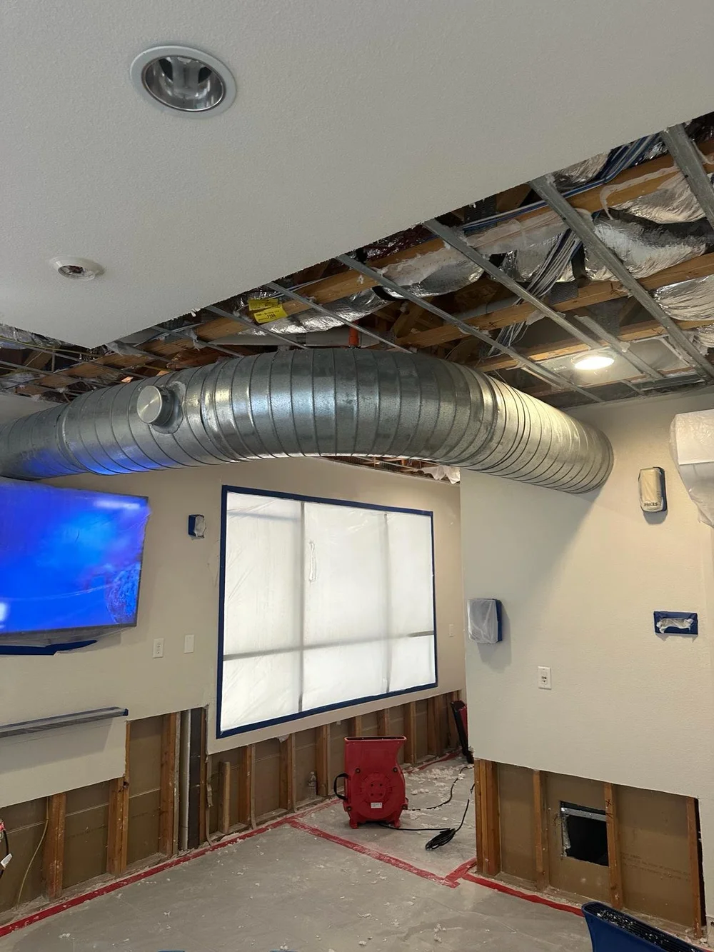 Water mitigation equipment in a multifamily building